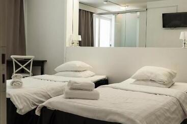 Li Alexanderin Huoneistohotelli Huoneet