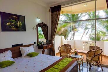 تختخواب و صبحانه Coconut Bay