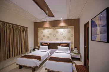 هتل Manek Svasti Inn