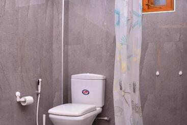 Отель The Swiss Lankan