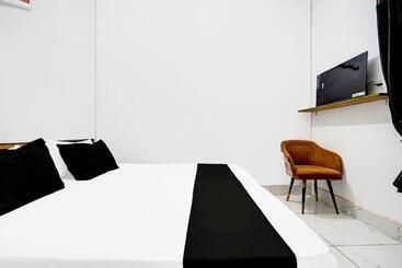 فندق O Eat Out Cafe & Rooms