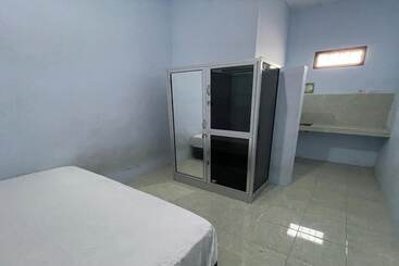 בית מלון כפרי Oyo 94160 Kost Btnompo