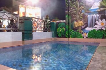 호텔 Puspa Tiara Syar I Guci Mitra Reddoorz