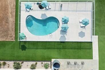 Blue Skies Retro Resort Pool Fireplace