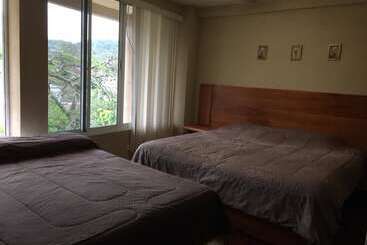 Отель Y Estancia 24 7