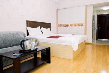 酒店 Weihai Dushang Huayi Apartment