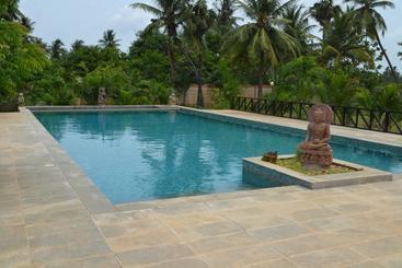 تختخواب و صبحانه Lily Pool Villa