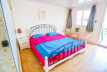 旅馆 Qingdao Ningye Xiaozhu