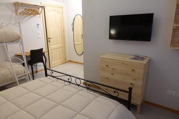تختخواب و صبحانه Rooms Maison 3 Magnoni