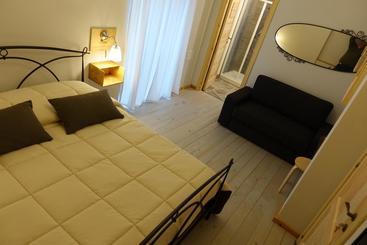 تختخواب و صبحانه Rooms Maison 3 Magnoni