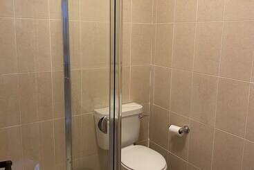 דירות לתיירים Racecourse Lodge Apartment