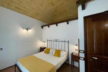تختخواب و صبحانه Ai Dammusi Rooms