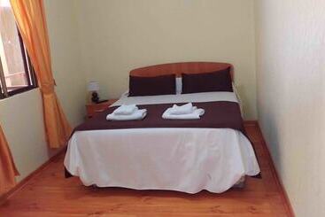 Отель Hostal Sol De Atacama