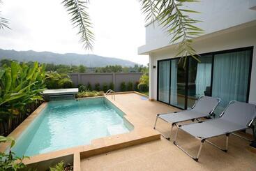 בית מלון כפרי Pumeria Resort Phuket