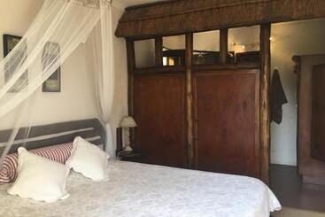 مبيت وإفطار Tropical Paradise