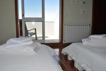 تختخواب و صبحانه Sun & Sand Guesthouse
