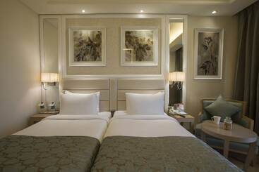 בית מלון כפרי Singhania Sarovar Portico