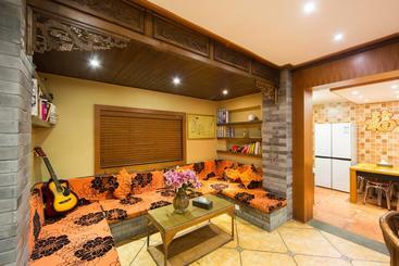 هتل Lijiang He Mu Ju Family Inn