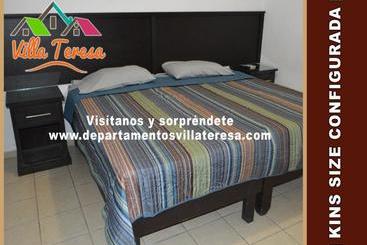هتل Departamentos & Suites Villa Teresa