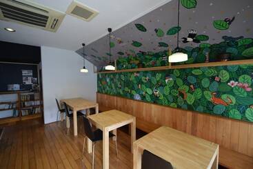 Отель Saga International Guesthouse Hagakure
