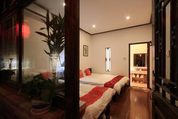 בית מלון כפרי The Great Wall Courtyard Hostel