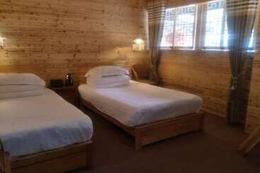 Nanjing Tulou Qingdelou Inn