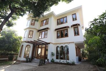 هاستل Mango Hill Inn