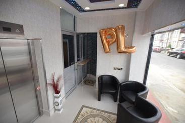 Отель Premierlux Serviced Apartments