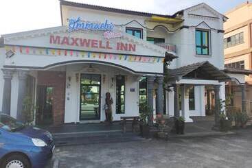 בית מלון כפרי Capital O 90653 Maxwell Inn Boutique