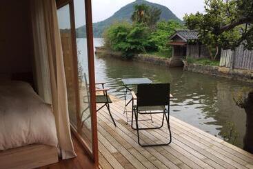 فندق Waterside Cottage Heron