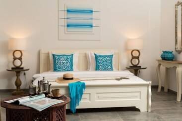 בית מלון כפרי Tikitam Palms Boutique