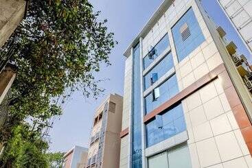 Отель Fab Leela Grand Inn