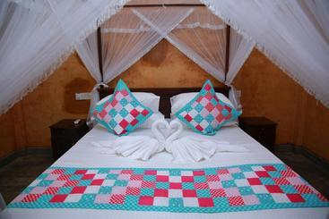تختخواب و صبحانه Limecabanassrilanka