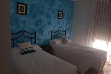 ペンション Hostal Cabañas