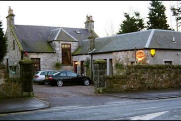 פנסיון Clarke Cottage Guest House