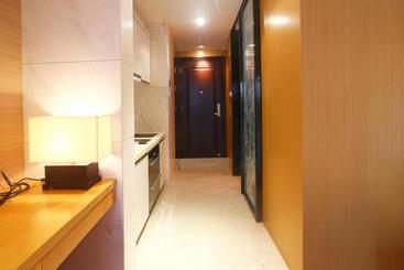 هتل Qingshuiwan Mandao Apartment