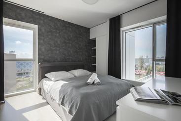 هتل Poznan Apartments Towarowa