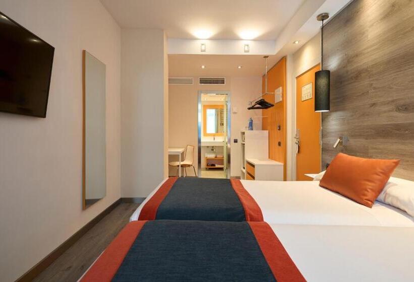 Отель Catalonia Mikado