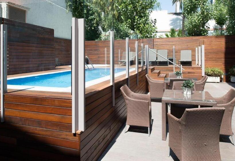 Отель Catalonia Mikado