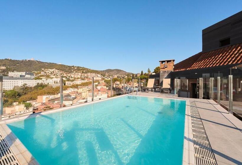 Отель Catalonia Park Guell