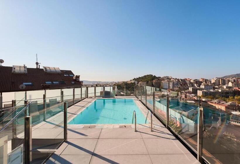 Отель Catalonia Park Guell