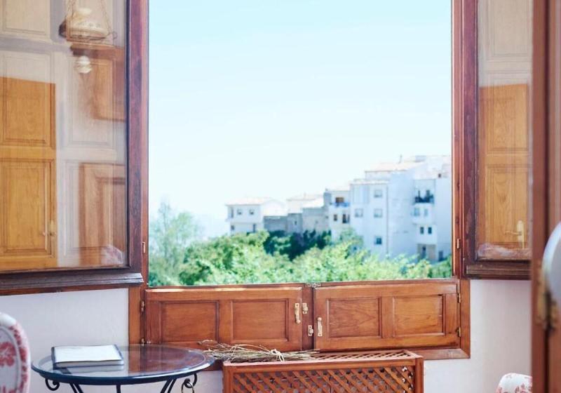 Отель Casa De Los Arcos