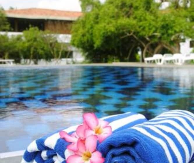 Отель Peacock Beach Resort & Spa