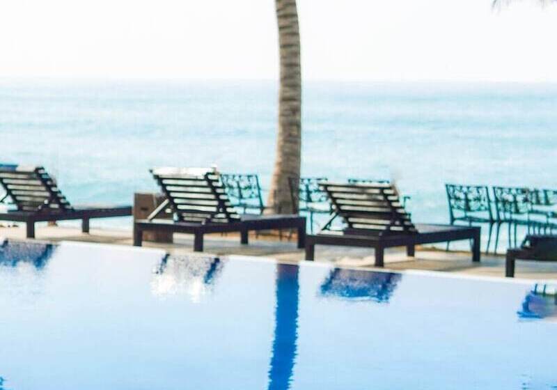 Отель Peacock Beach Resort & Spa