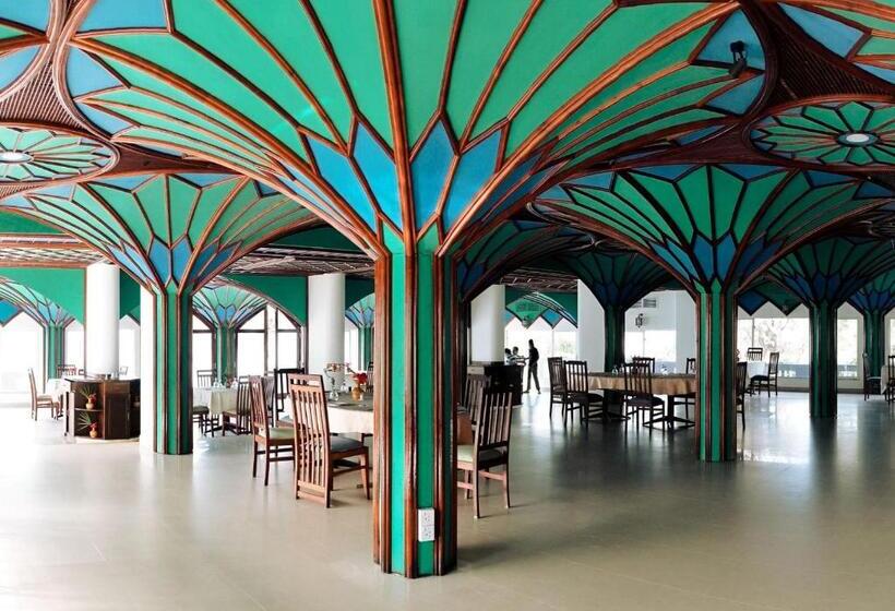 Отель Peacock Beach Resort & Spa