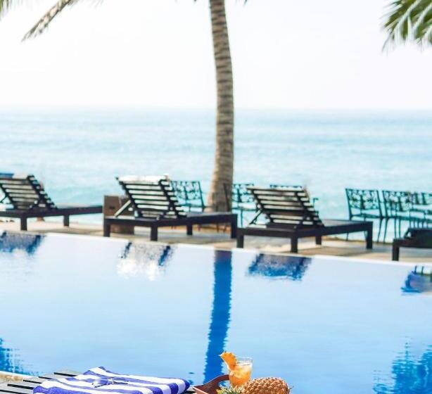 Отель Peacock Beach Resort & Spa