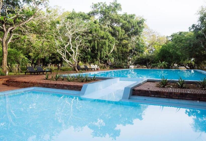 Отель Peacock Beach Resort & Spa