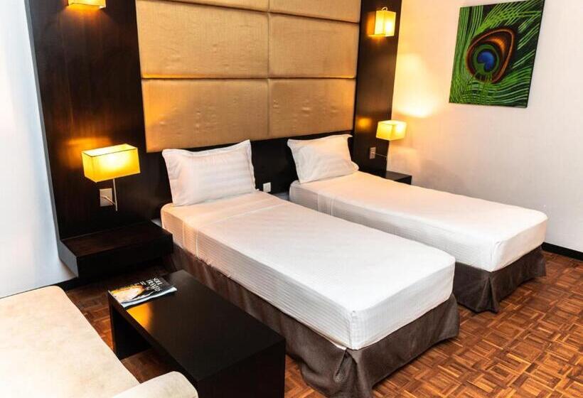 Отель Peacock Beach Resort & Spa