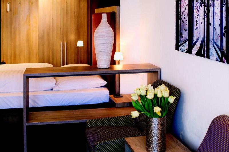 Отель Am Schlosspark Garni