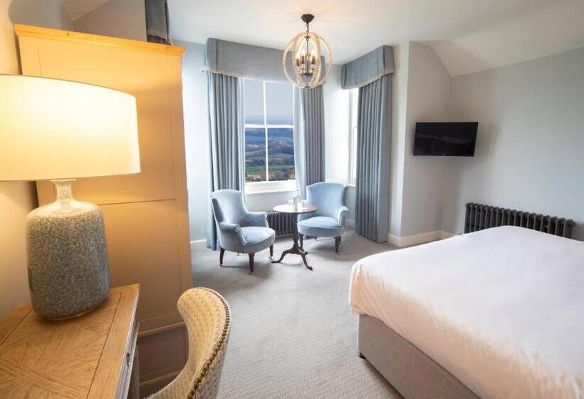 Отель Cottage In The Wood